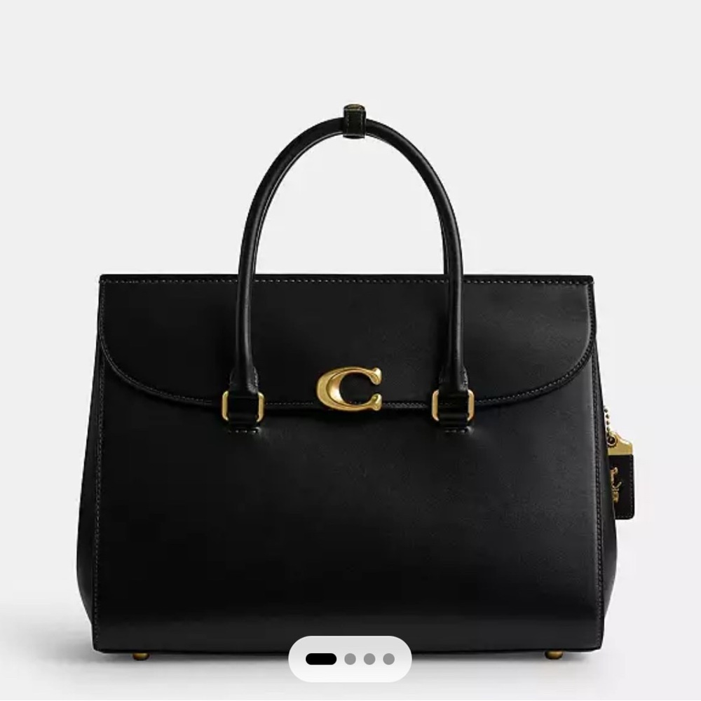 Elegant Coach Black and Gold Laptop Bag with Structured Design